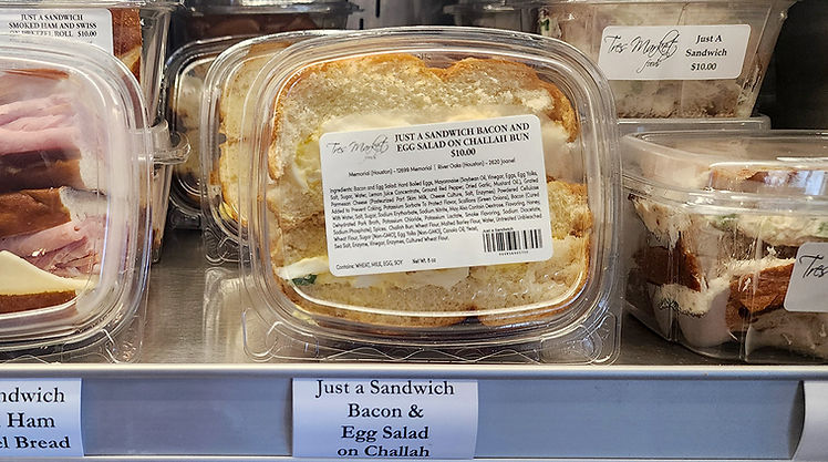 Bacon & Egg Salad on Challah Bun Sandwich