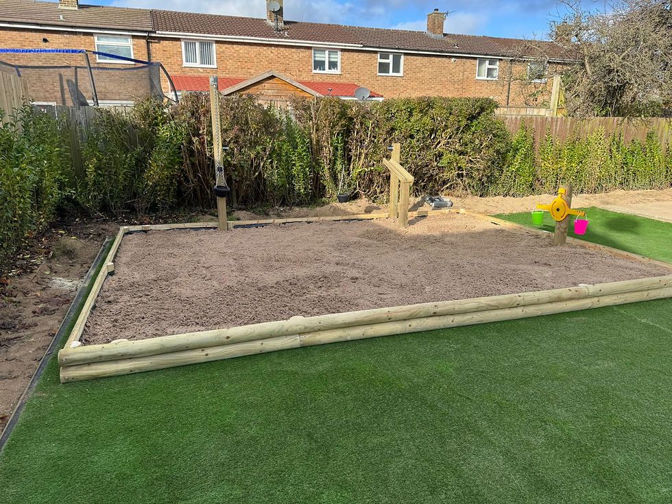 Large bespoke sand pit in playgroun