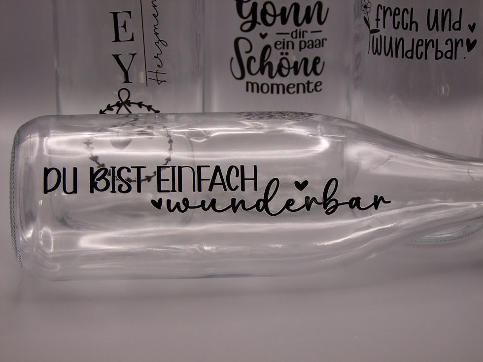 Miniaturbild: Glasflasche mit Schnappverschluss und Schriftzug