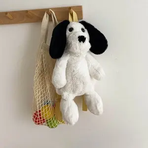 Plush dog backpack and net bag with fruit on pegs