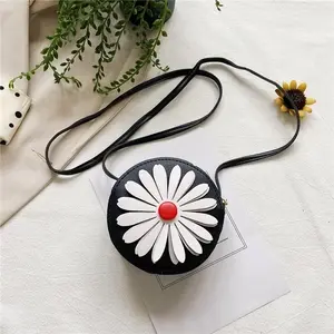 Black circular bag with white daisy flower