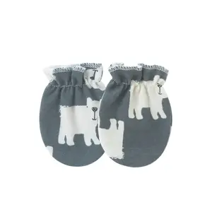 Newborn gray mittens with white animal print