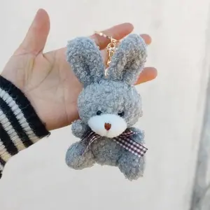 Fluffy gray rabbit keychain with plaid bow