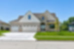 dynasty-homes-front-exterior-stone-board-batten-3-car-garage-johnston-iowa-10622-nw-80th-a
