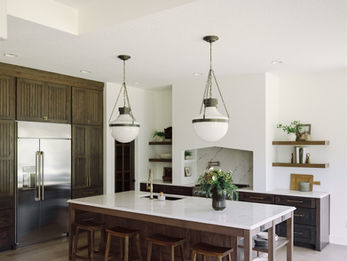 Modern kitchen with large island and pendant lights