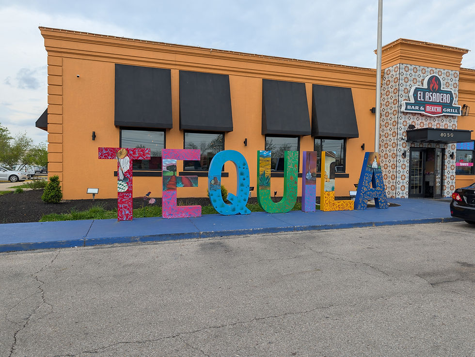 Large Tequila sign in front of El Asadero Bar and Mexican Restaurant Reynoldsburg
