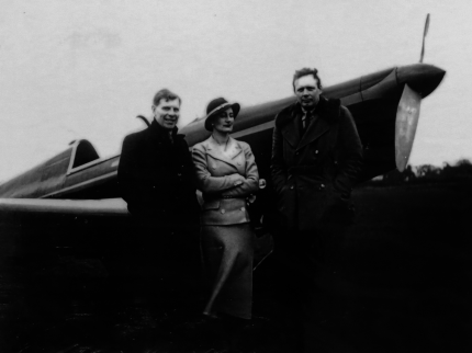 F.G. and Blossom Miles with Charles Lindbergh along with his Mohawk aircraft
