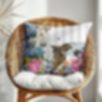 Sweet Dreams equestrian floral cushion styled on wicker chair with hydrangeas, peonies and horse artwork in sunlit co
