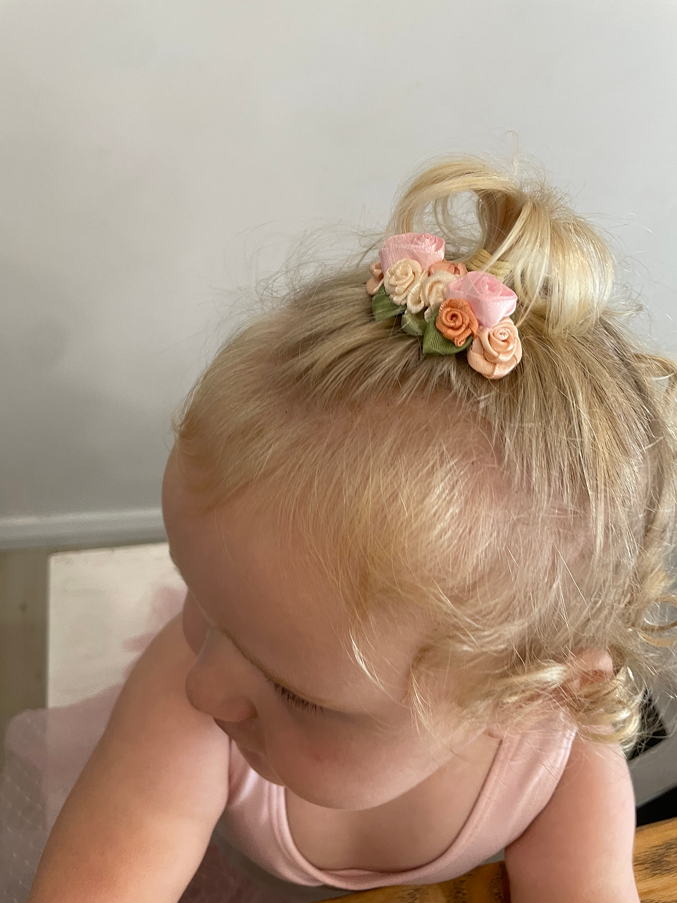 Thumbnail: Hair piece by Ballerina Bun Blossoms