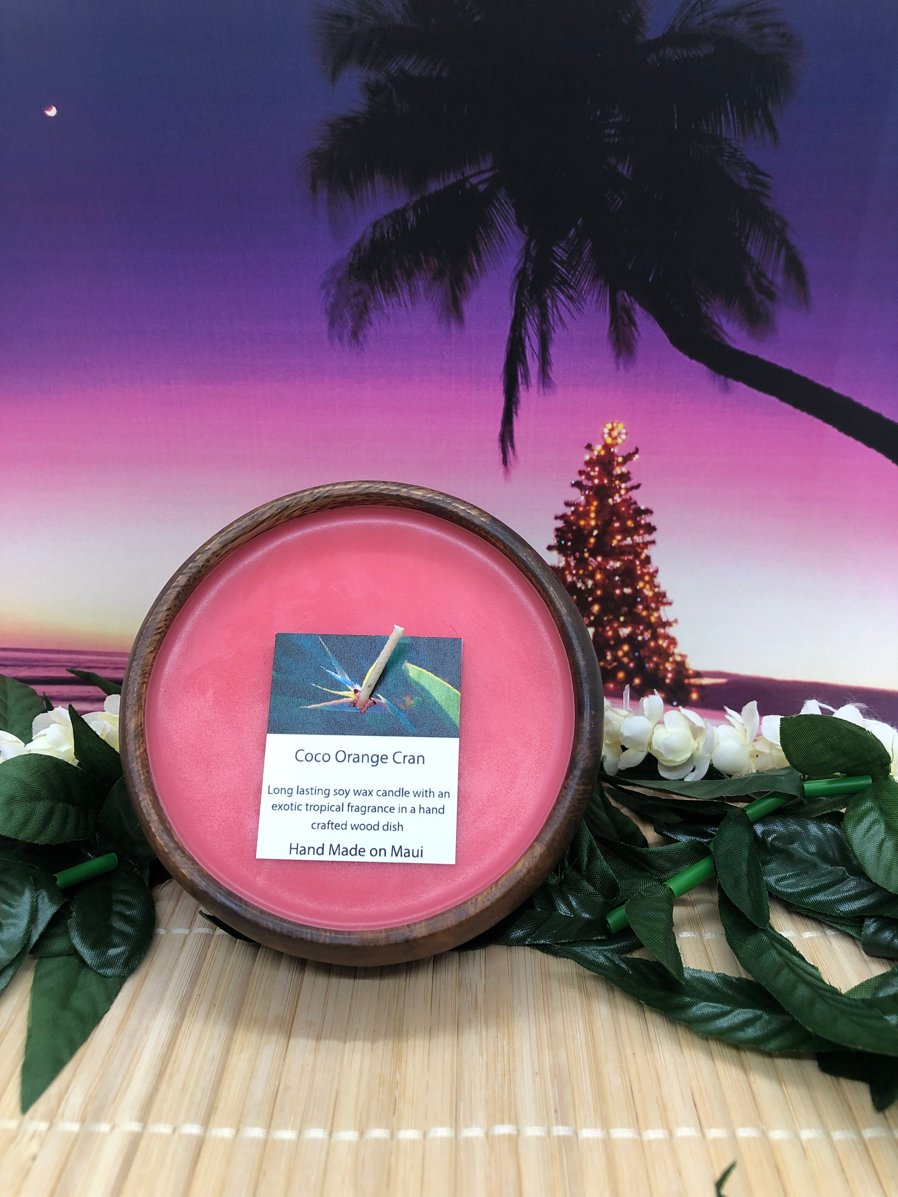 Coconut Orange Cranberry Soy Wax Candle in a Monkeypod Wood Bowl. Red in Color. Smells like homemade cranberry sauce!