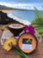 Hawaiian Fruit Soy Wax Candle in a Polished Coconut Shell.  Orange in Color, Smells like Passion Fruit, Mango, Papaya, Guava.