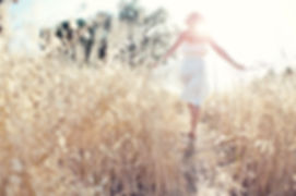 Woman Walking in the Field