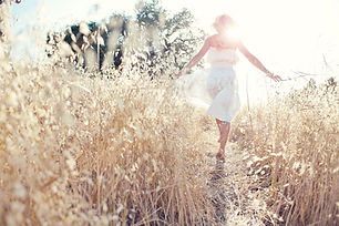 Woman Walking in the Field