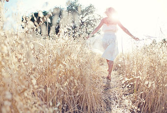 Woman Walking in the Field