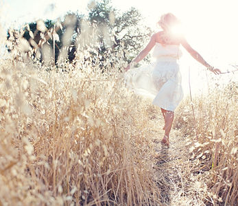 Woman Walking in the Field