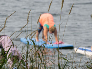 A Seattle Experience: Paddle Board Yoga with SUP Yoga Seattle