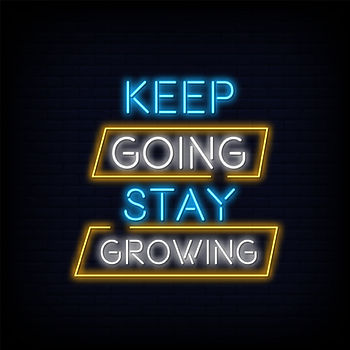 Motivational graphic reading “Keep Going, Stay Growing” in illuminated lettering on a dark background.
