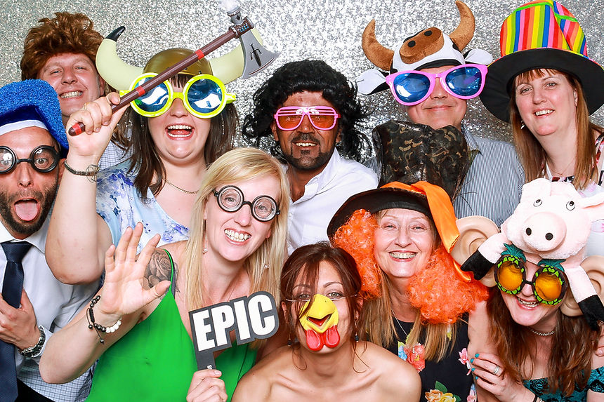 Group photo booth fun, EPIC sign, silly props