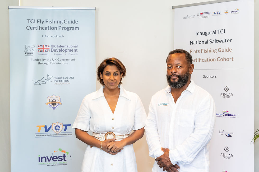 Governor Dileeni Daniel-Selvaratnam and TCFFA President Levardo Talbot stand together at the opening ceremony of the Turks and Caicos National Flats Fishing Guide Certification.