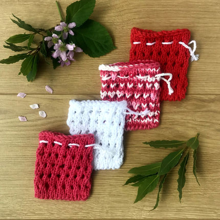 4 red, pink and white soap saver sacks