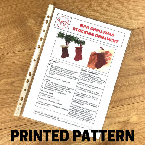 A printed knitting pattern for mini Christmas stockings