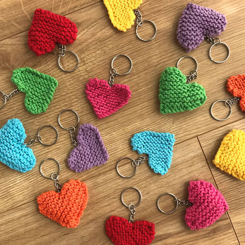 Keyrings with mini love heart hand knitted in 100% recycled yarn in all 7 colours of the rainbow