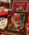 Christmas promotions in store with a picture of santa claus in front