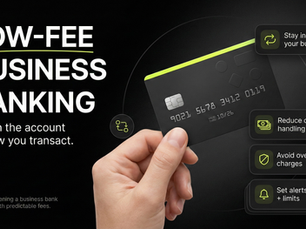 Dark 16:9 finance-themed graphic showing a hand holding a matte-black business card on the right, a bold left headline about low-fee business banking, and a stack of small UI cards listing fee-saving tips with subtle lime accents.
