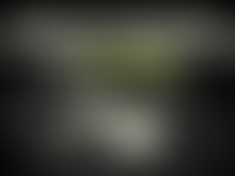 Dark 16:9 marketing graphic with a bold headline about SEO services for small businesses in Gauteng above a smartphone on a black surface, with a charcoal ribbon draped over the phone and lime accents on a grainy black background.