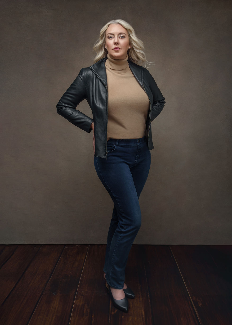 Woman wearing leather jacket and jeans