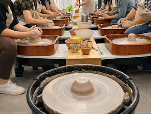wheel throwing class with several students at myrtles clayhouse