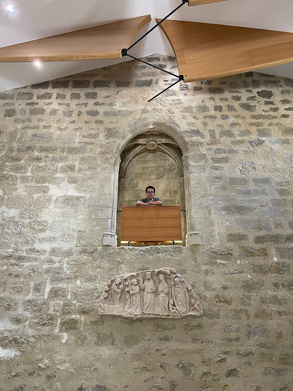 Posing at the pulpit where the Gospels were once read to the monks at the refectory.