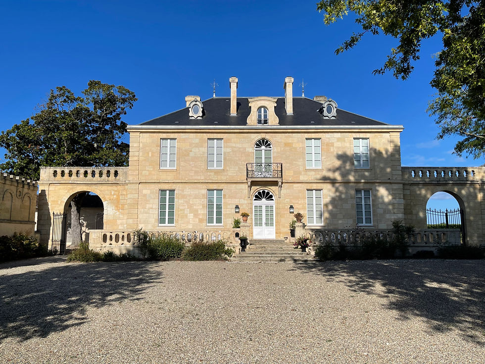 A striking photo of Château Kirwan's façade, showcasing the elegant 18th-century architecture of the estate.