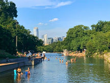 Barton Springs pool in Summer with people swimming
