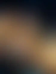 Two men in military uniforms and headsets look surprised, sitting amid smoke and blue lighting. A spotlight shines beside them.