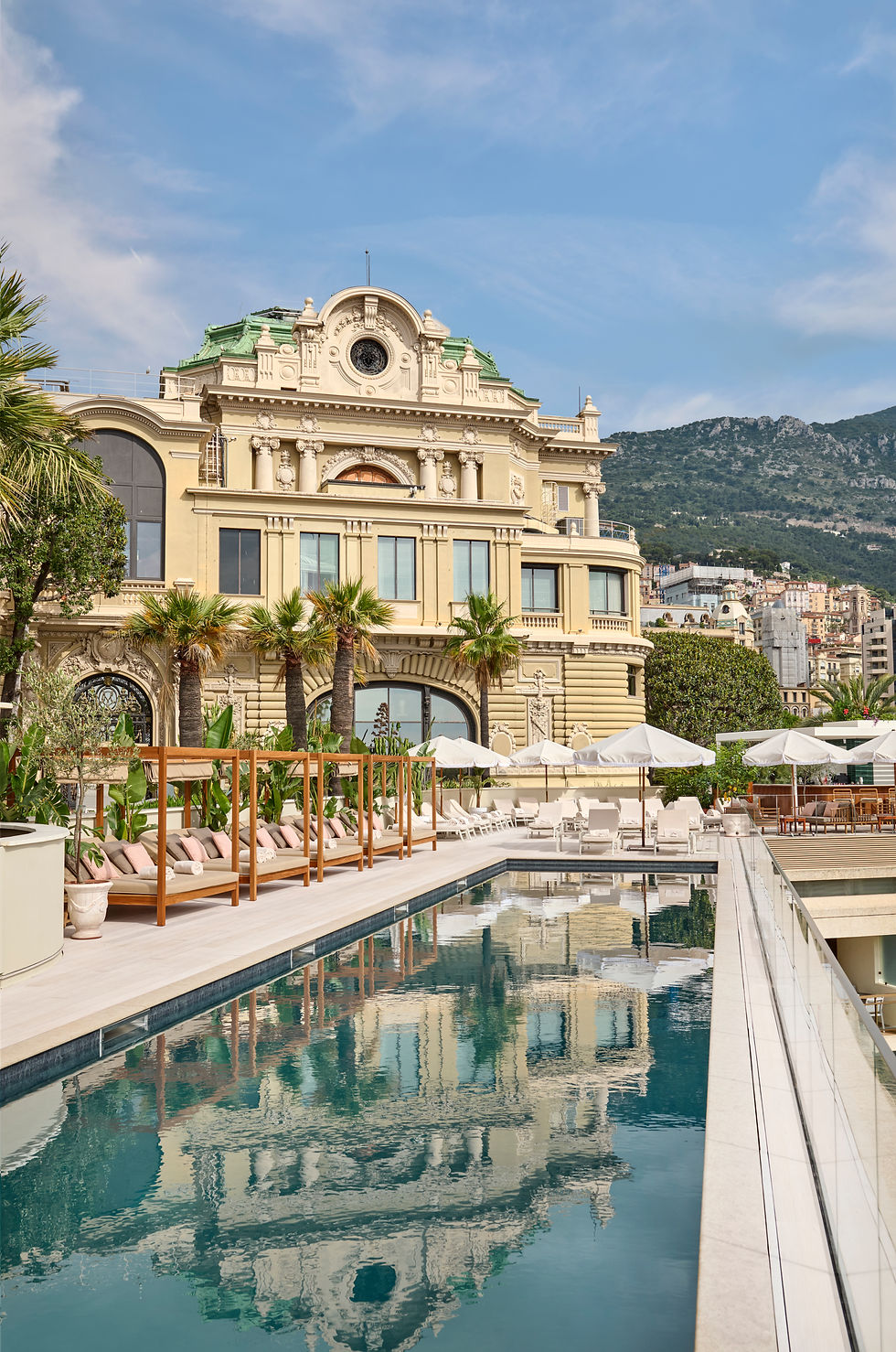 Grand hotel in Monaco style with outdoor pool