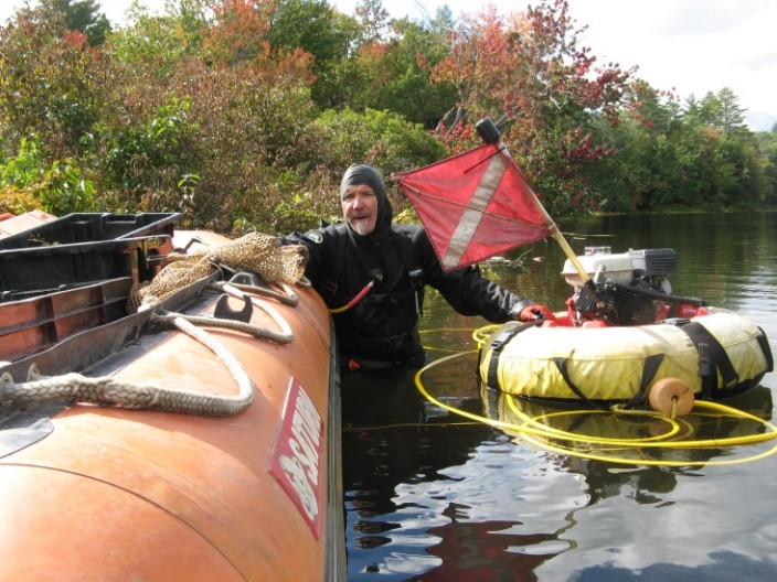 Cliff Cabral diving for milfoil