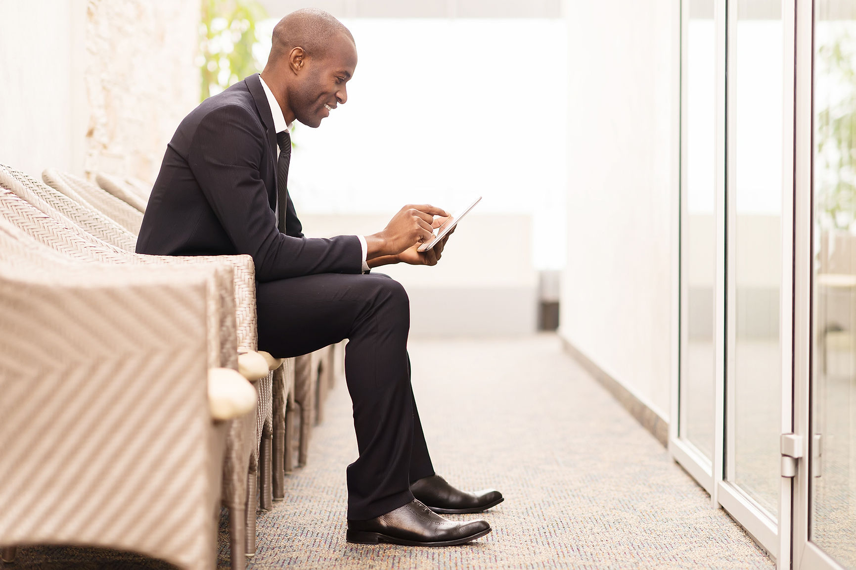 Confident businessman waiting for an int