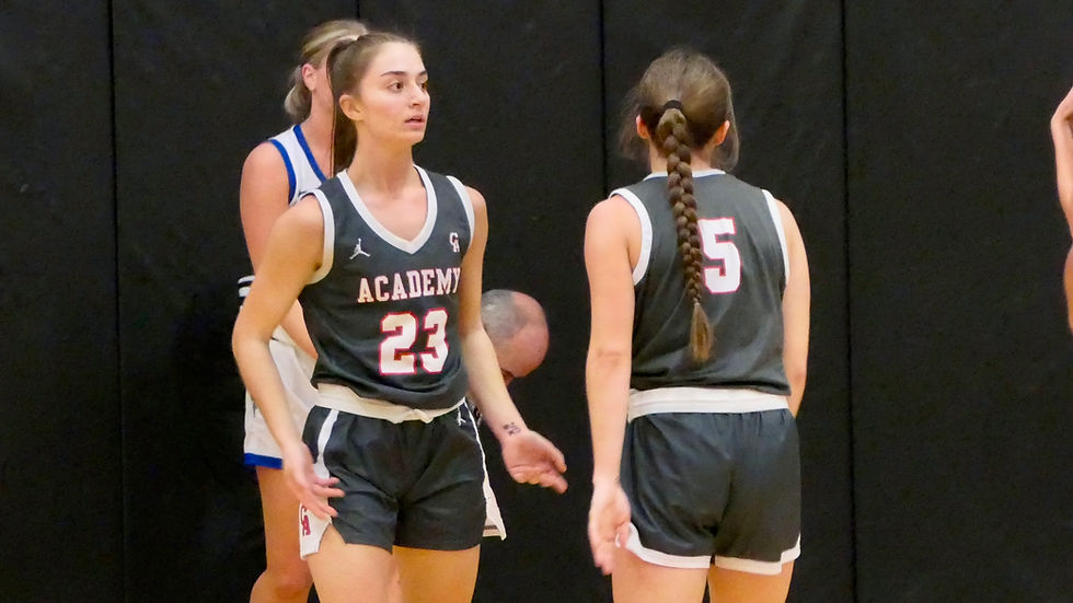 Canandaigua's Ava Read (23) and Leah Sheridan (5) between possessions. Canandaigua defeated Brockport on the road 52-42 on Thursday, January 30, 2025. Photo Credit: Victor Menendez / 89.1 the Point