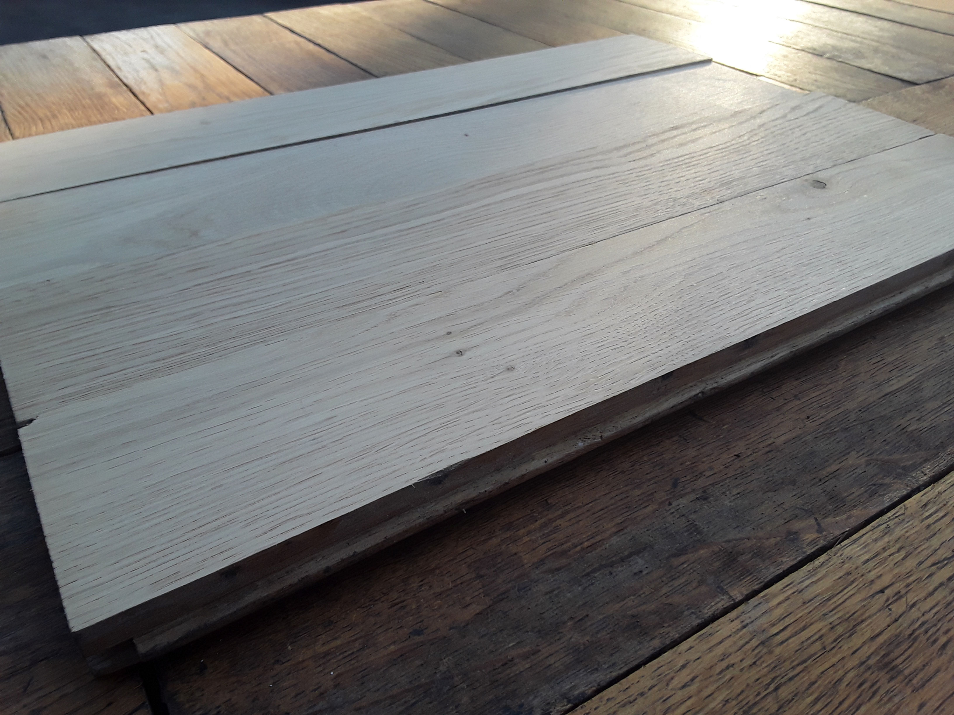 Reclaimed dark oak parquet. 16 inches long. 2.8 inches wide. 20 mm thick. £40/sm