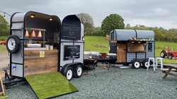Two vintage blue horse boxes