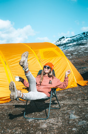 lady relaxes on the beach to get away from. the everyday stress