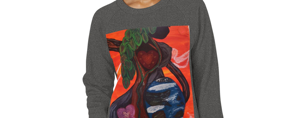 Lady wearing a long sleeve crew neck with an original art piece depicting mother Gaia