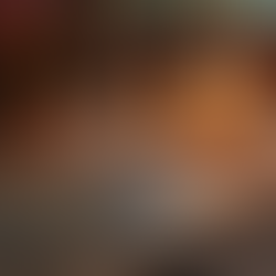 Candle lit room with tarot spread on the table