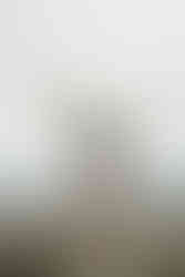 Man practices Yoga on the beach to release anger issues