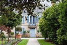 facade-of-a-classic-architecture-and-garden-in-fra-2026-03-18-07-07-11-utc (1).jpg