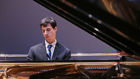 Mr. Jones Playing Piano Photo