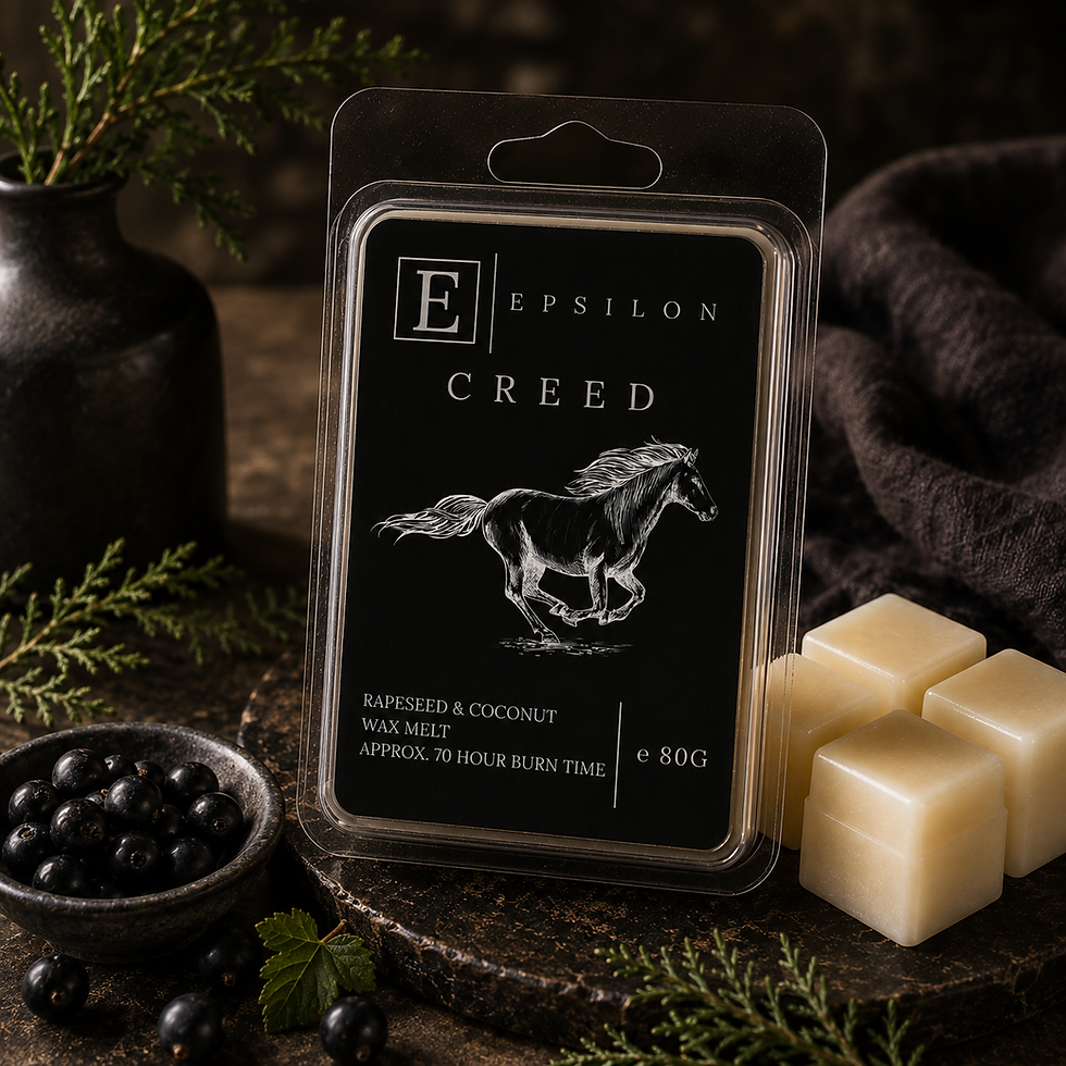 Epsilon Home Creed wax melt in a sophisticated dark setting with blackcurrants, evergreen foliage, natural textures and warm