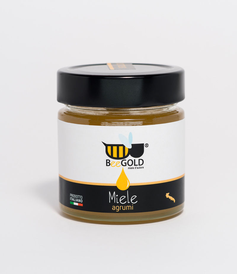 Vaso in vetro di miele di agrumi del salento