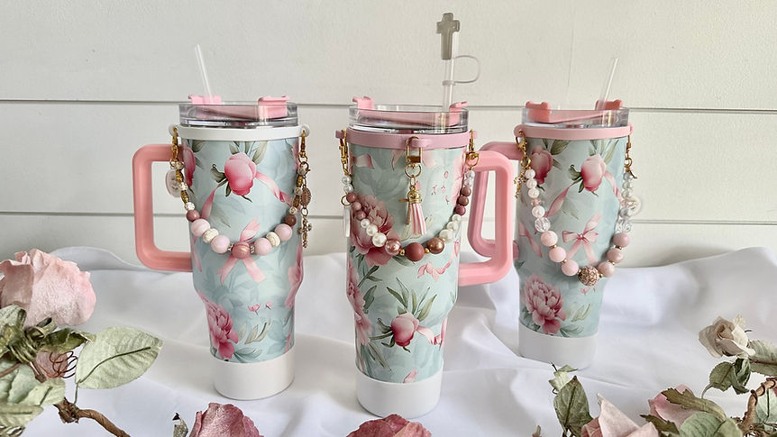 Floral tumblers with pink handles for home decor